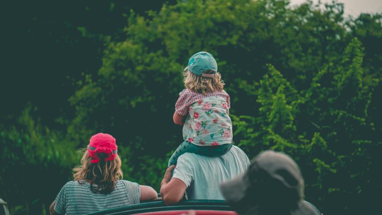 Child on shoulders