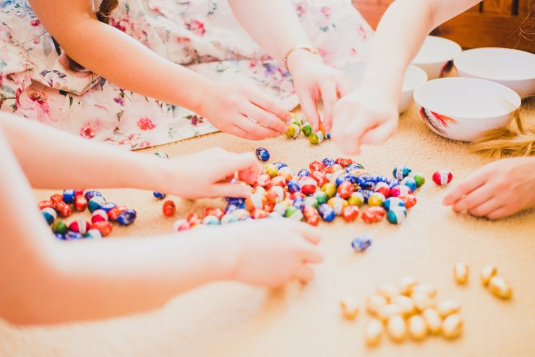 Group of children with chocolate eggs