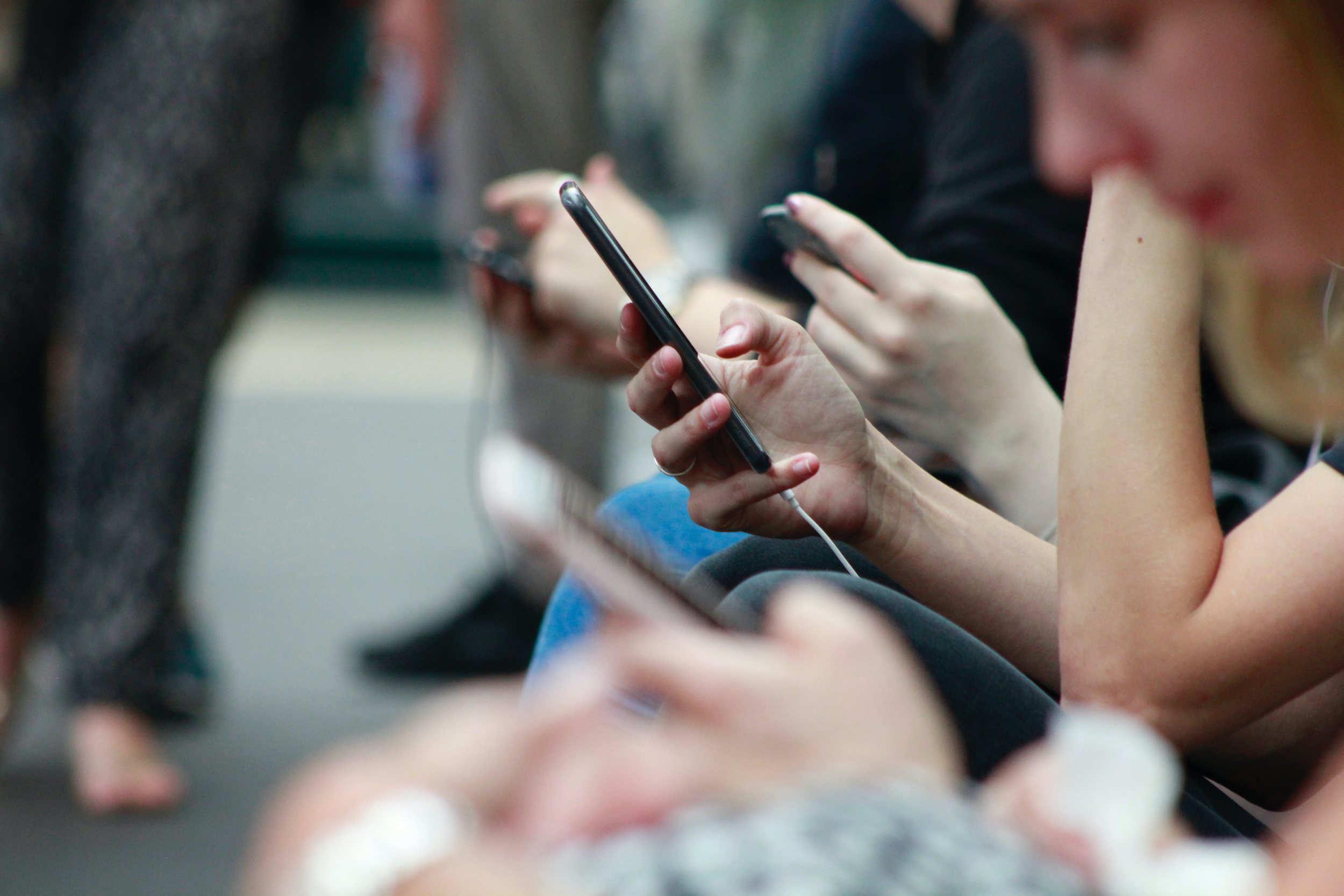 People holding phones