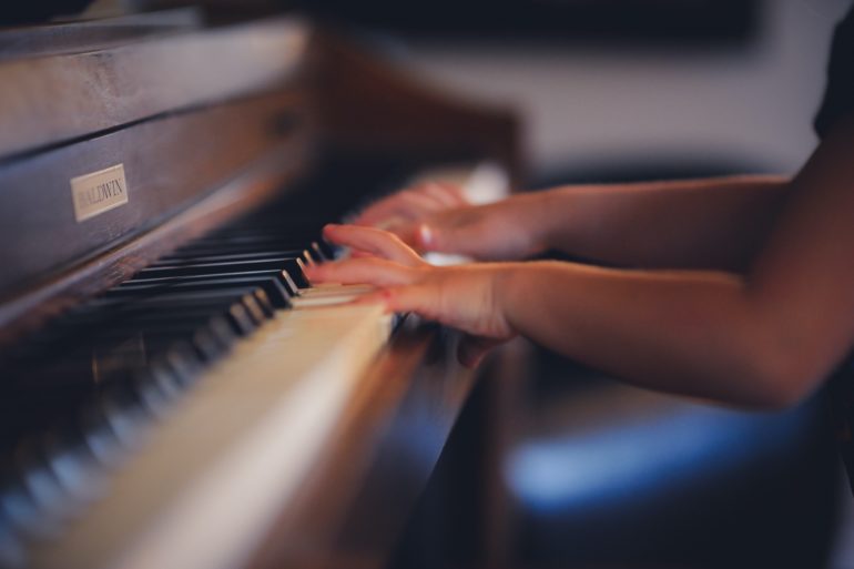 Child playing piano