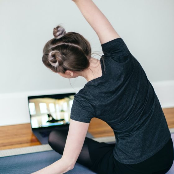 Girl doing yoga at home