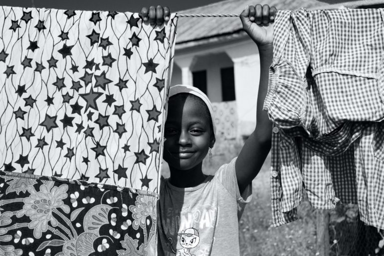 Child with clothesline