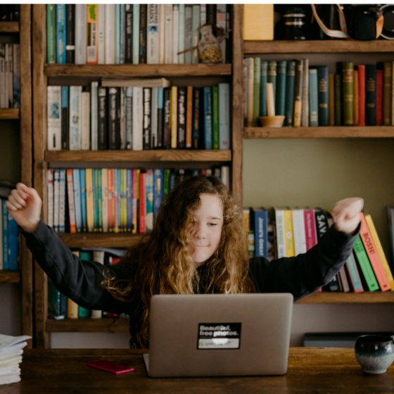 Girl on computer at home