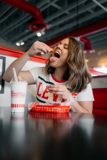 Girl eating fries