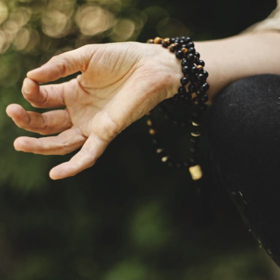 Hand in meditation position