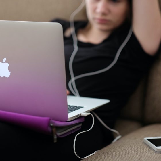 Girl on couch with laptop