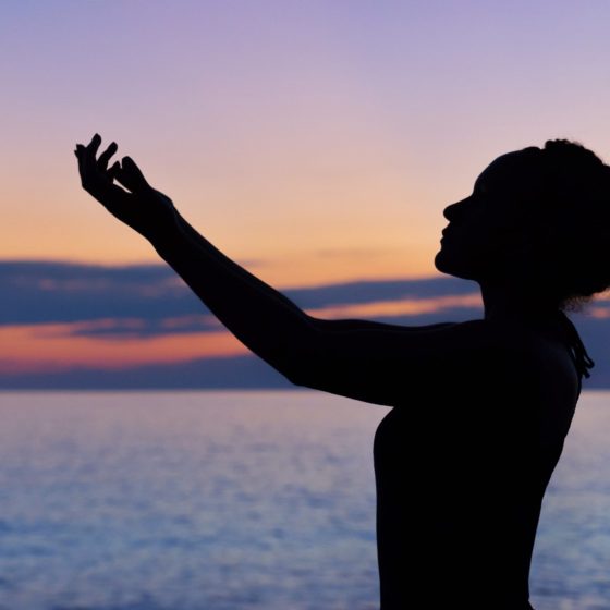 Silhouette of woman at the beach