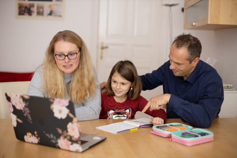 Parents teaching child