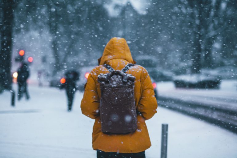 Person in the city during winter